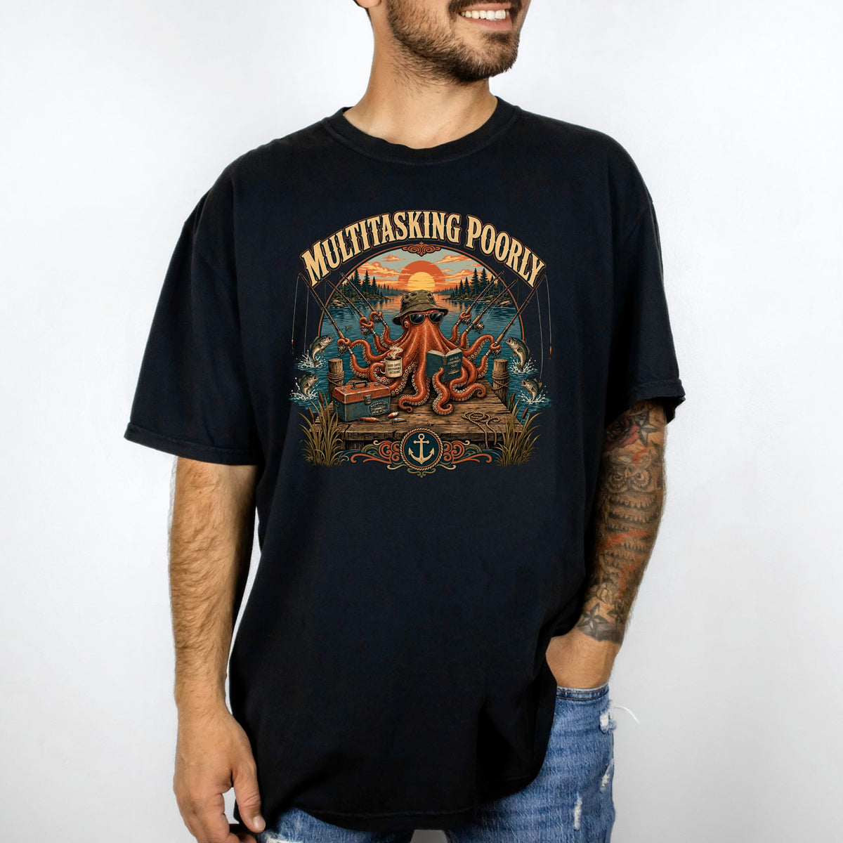 Black t-shirt with graphic "Multitasking Poorly" featuring an octopus fishing.