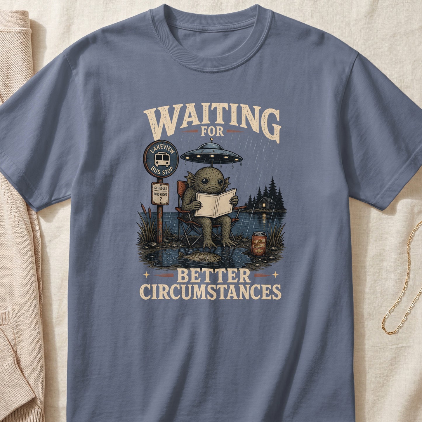 Cryptid reading by a bus stop under a UFO, with text "Waiting For Better Circumstances".