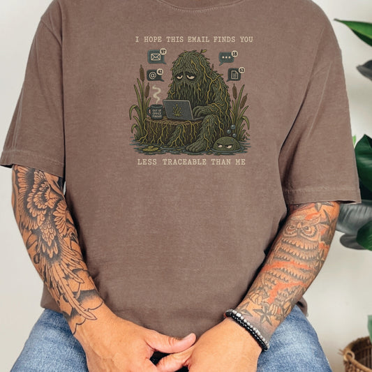 Graphic of a Bigfoot character with a laptop and messages, text reads "I HOPE THIS EMAIL FINDS YOU LESS TRACEABLE THAN ME".