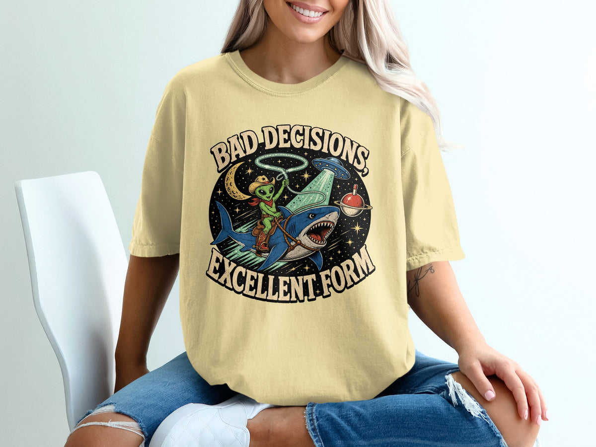 Alien cowboy rides shark with text "Bad Decisions, Excellent Form".