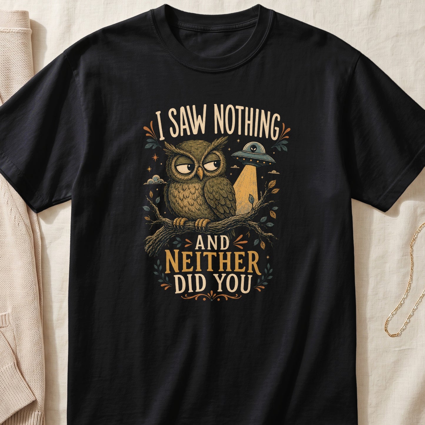 Black t-shirt with owl, UFO, and text "I saw nothing and neither did you".