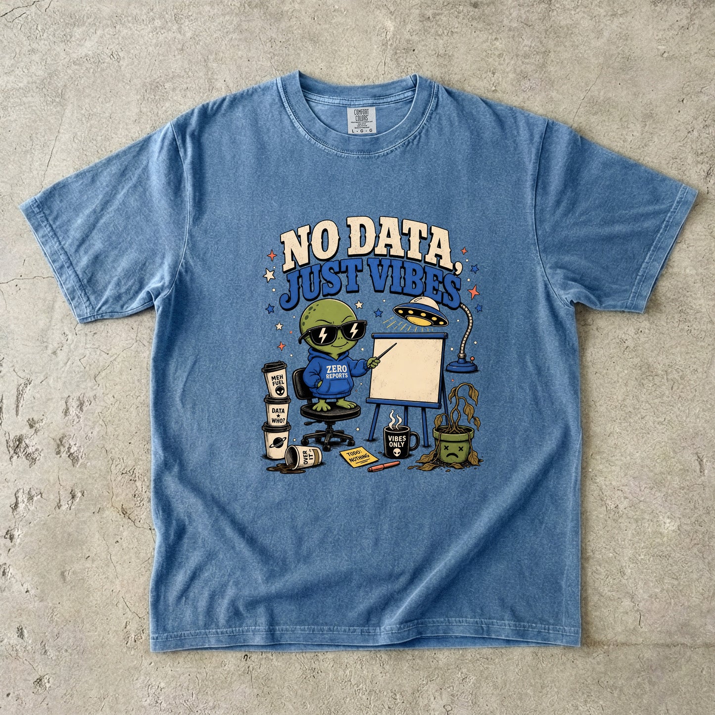 Blue t-shirt with alien graphic, "No Data Just Vibes," and coffee cups.