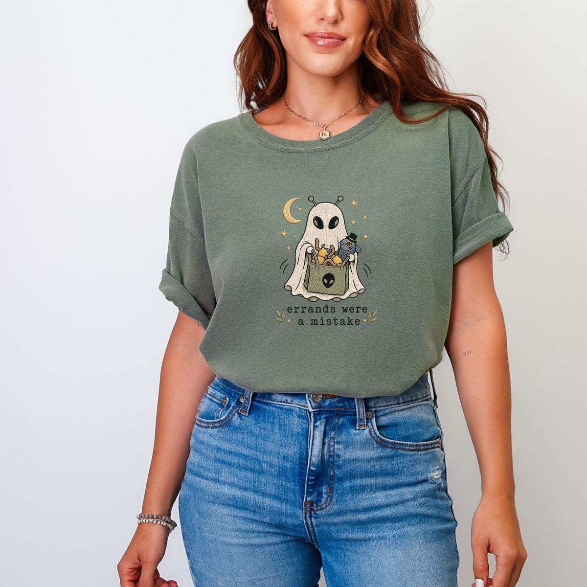 Green t-shirt with ghost alien carrying a bag of worms and lemons, text reads "errands were a mistake."