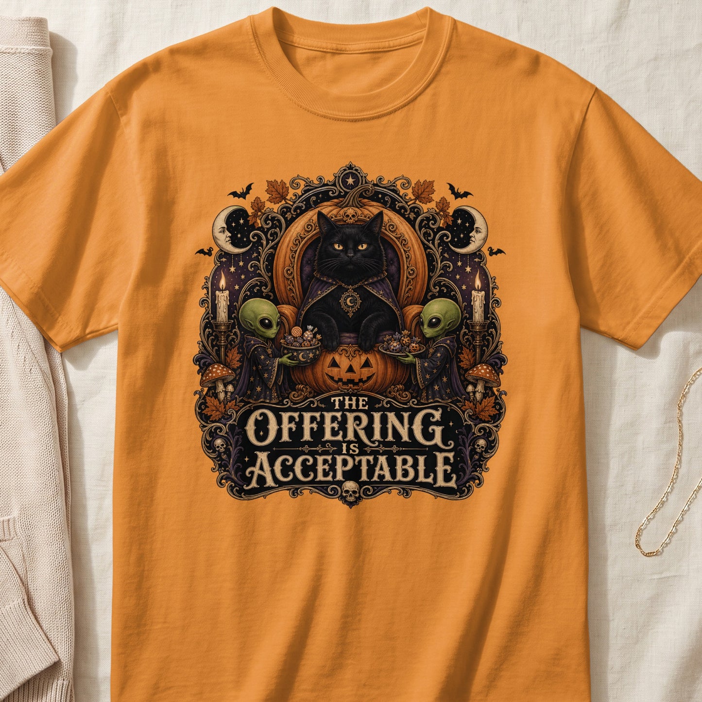 Black cat wearing cape with moon and stars, aliens offering candy, text "The Offering Is Acceptable."