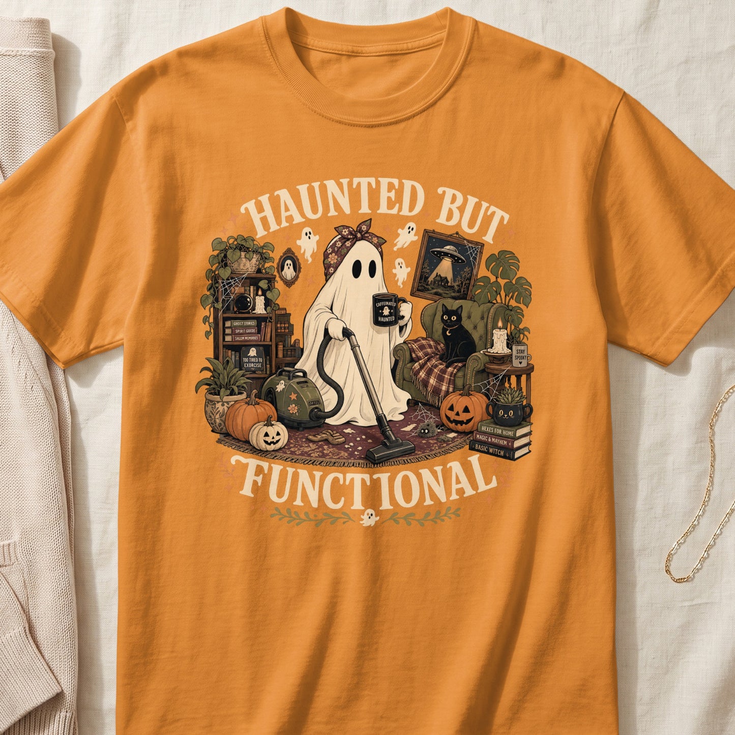 Ghost holding vacuum and coffee on t-shirt with text "Haunted But Functional".