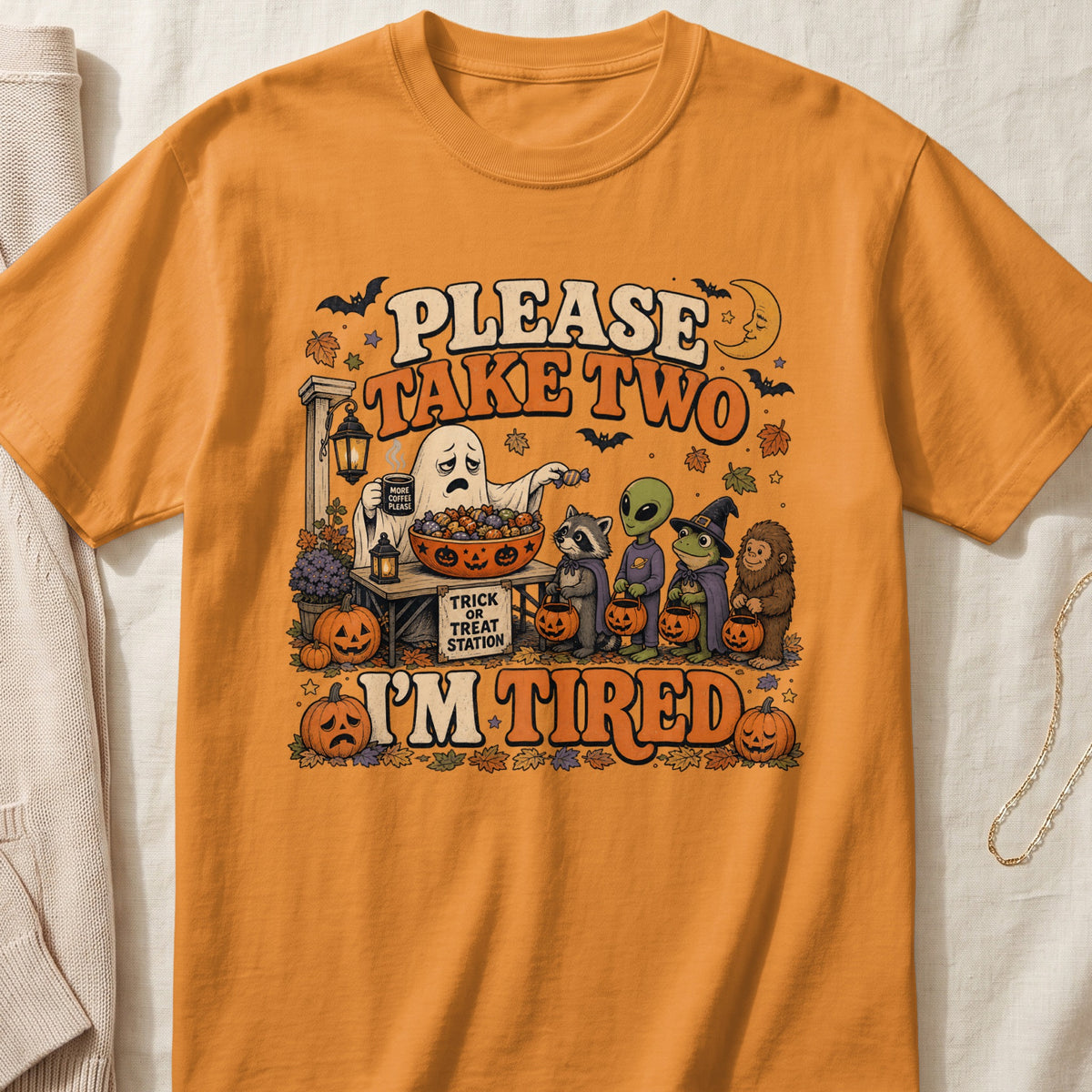 Please take two, I'm tired, with a ghost, alien, and other creatures at a trick-or-treat station.
