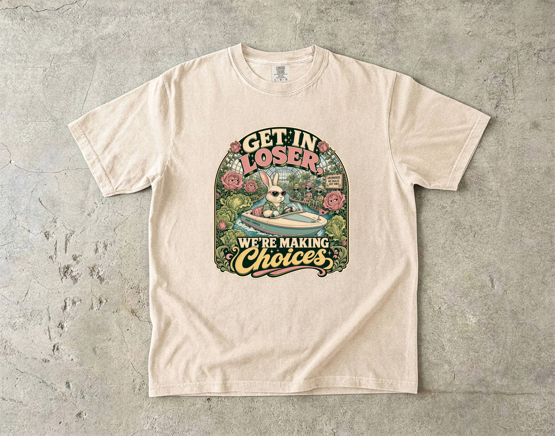 T-shirt with "Get in Loser We're Making Choices" text and rabbit in a boat graphic.