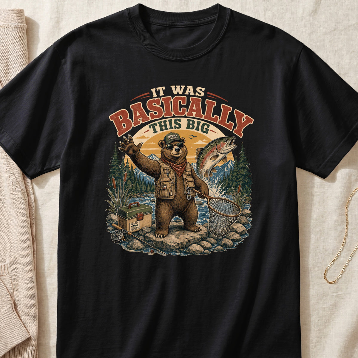 Black t-shirt with graphic of bear fishing, text "It Was Basically This Big".