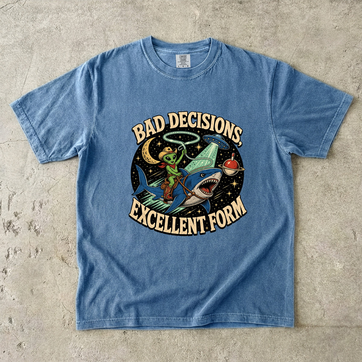 Blue t-shirt with alien riding shark, text "BAD DECISIONS, EXCELLENT FORM."